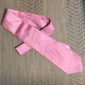Pink tie with small blue flowers